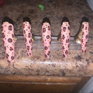 Cheetah red bottom nails